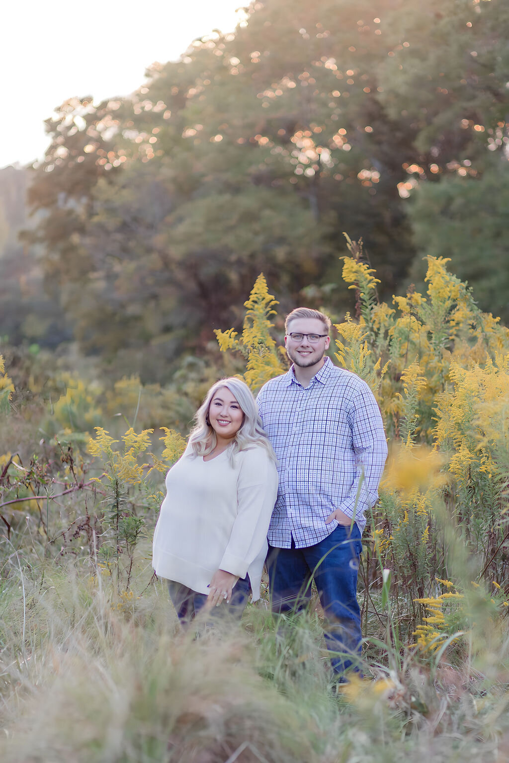 Couple during Charlotte family session in the golden sunset light