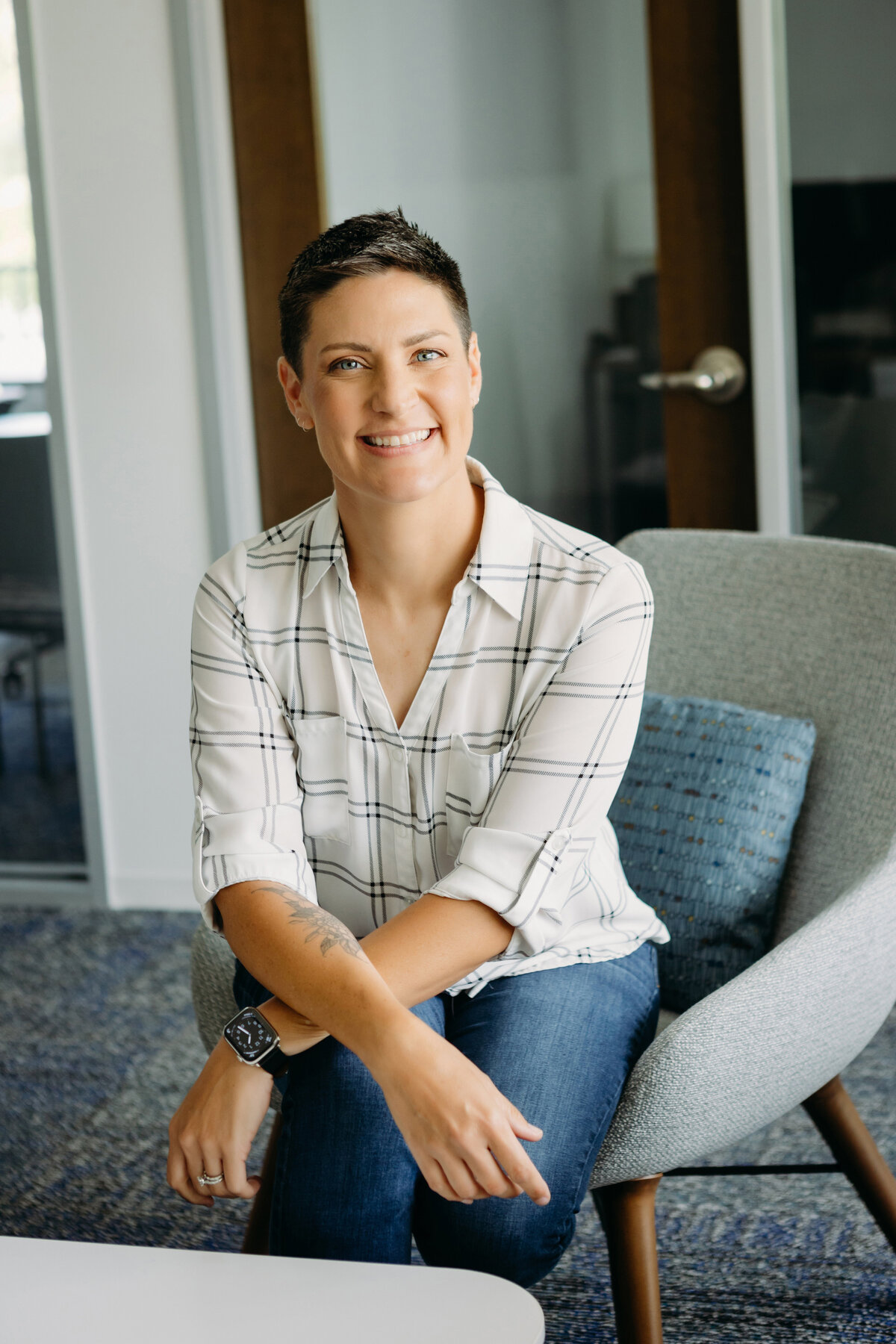 Woman smiles for brand portrait