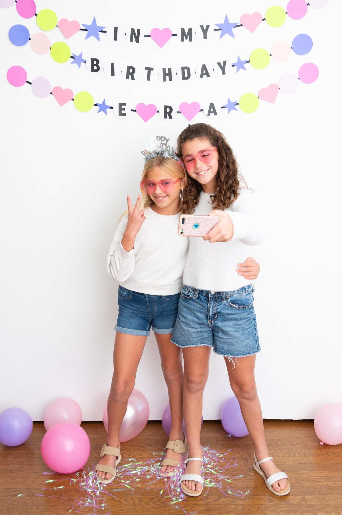 two girls taking selfie in my birthday era party