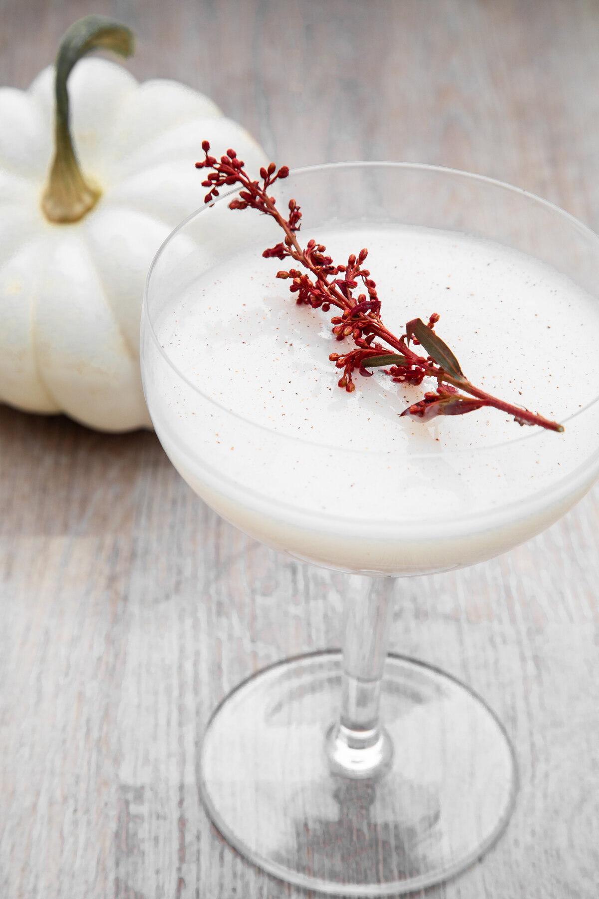 white pumpkin rumchatta cocktail for a classy halloween party.