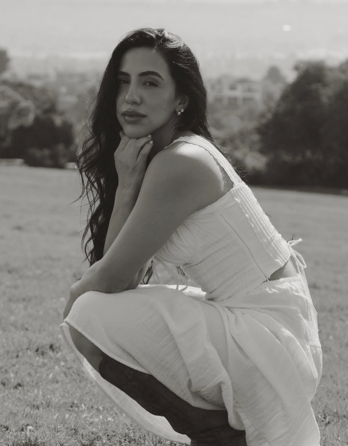 Portrait of the founder of The Complexion Club, a skincare club offering personalized treatments and a wellness experience, as showcased on their aesthetic-forward website.