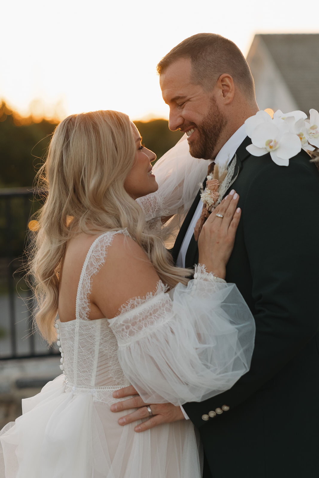 Bride and groom laughing together