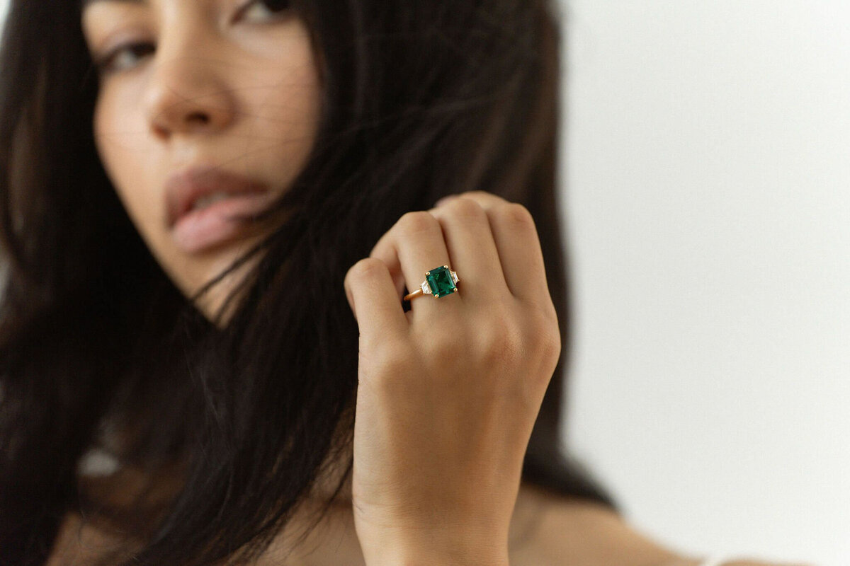 Emerald green engagement ring by Ma Folie Gems, romantic and modern wedding jewelry based in Vancouver.  Featured on the Brontë Bride Vendor Guide.