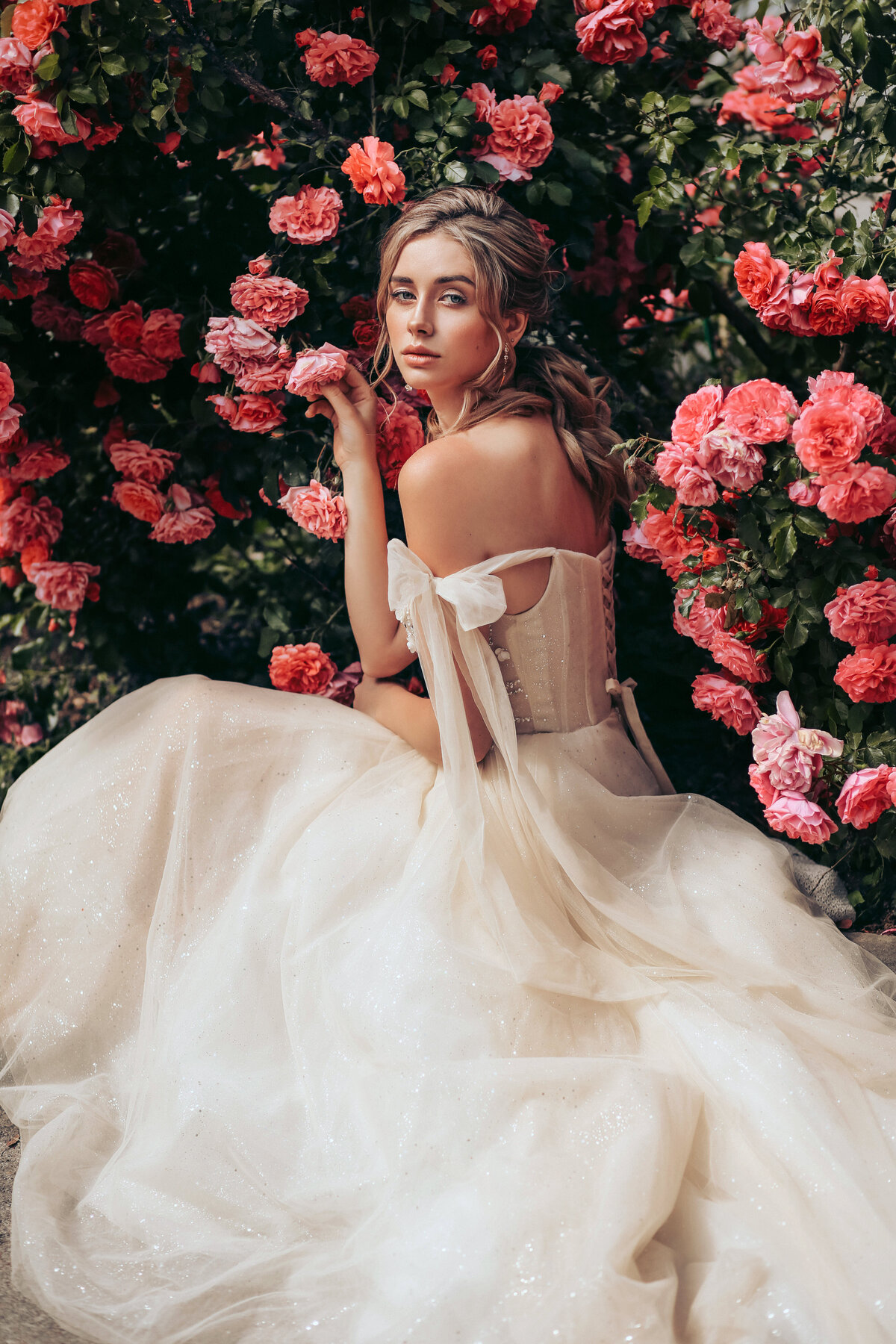 Bride-in-front-of-flowers