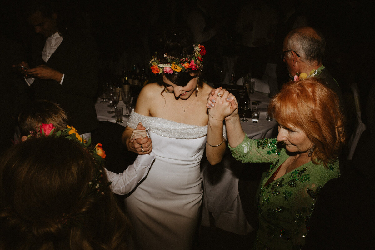 bride dancing with mum