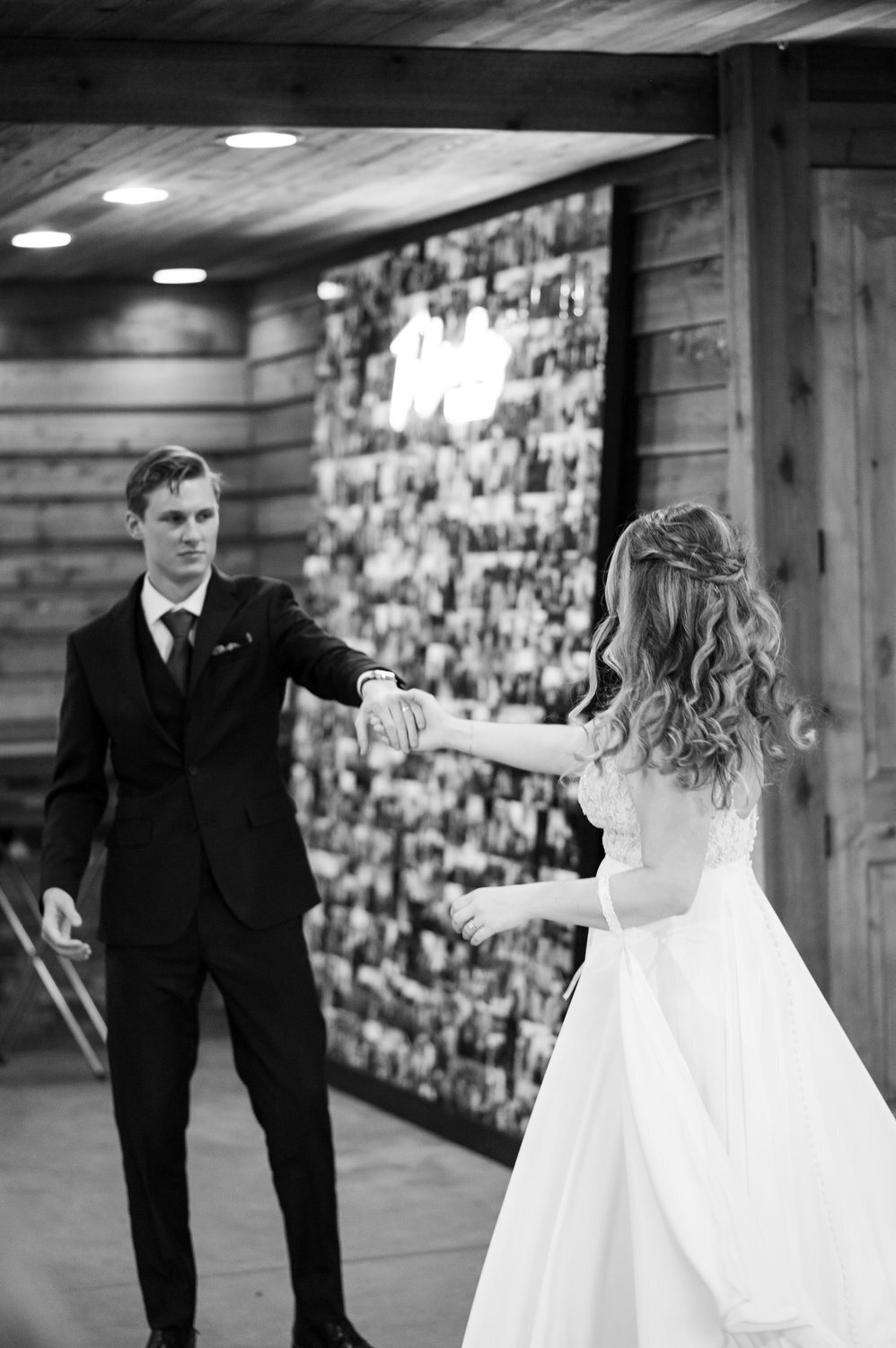 black and white bride and groom first dance image barn reception