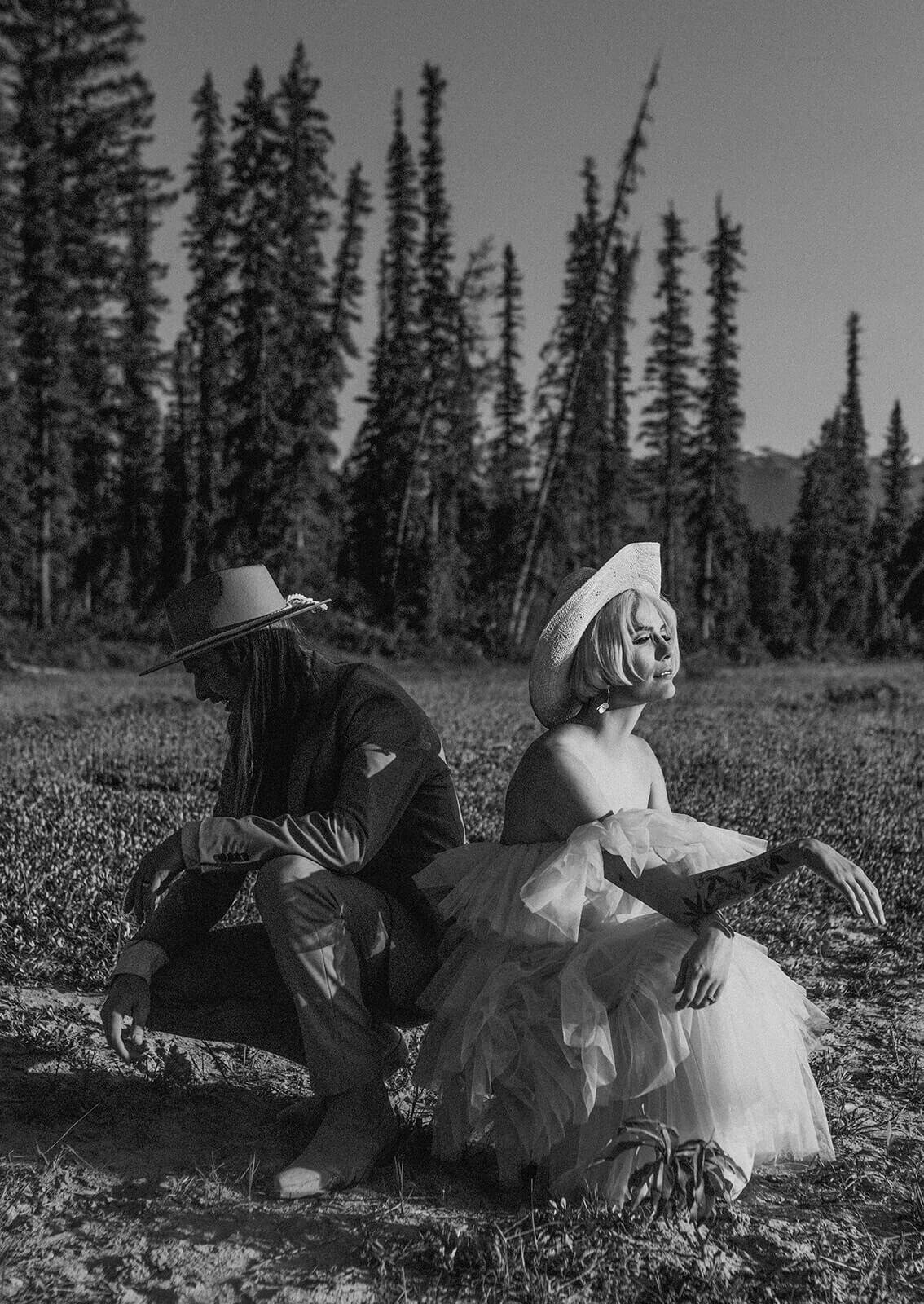 Elopement-couple-sitting-back-toback