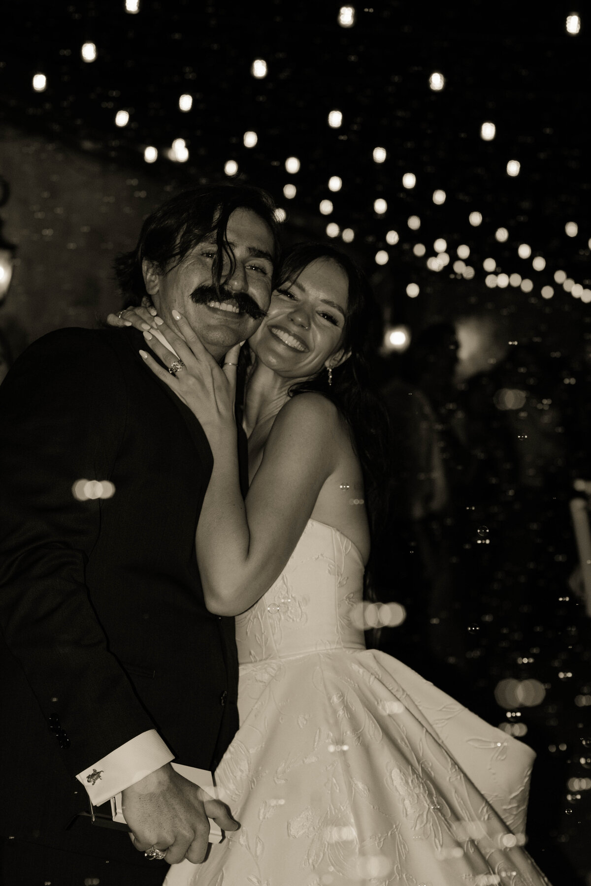 bride and groom wedding exit posed photo black and white photo