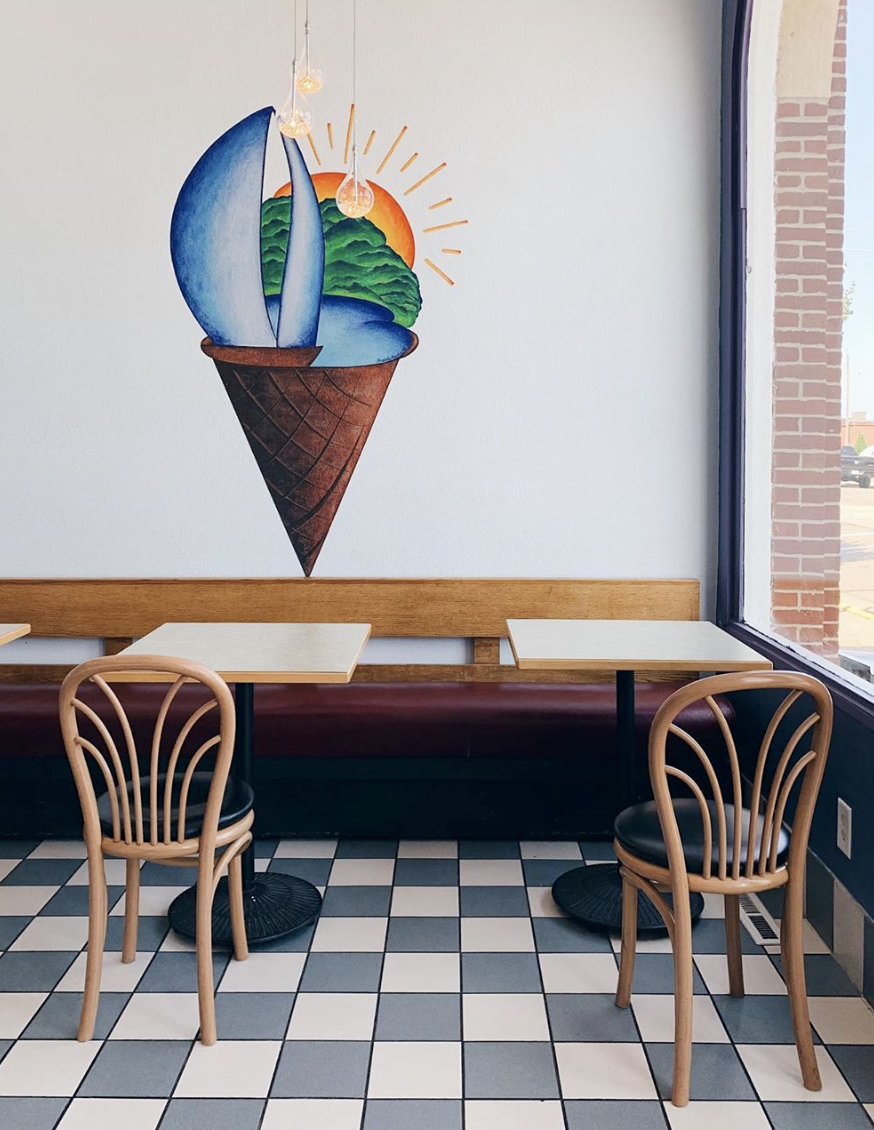 Dux Lake City Minnesota ice cream shop mural  painted by artist muralist Brandy Klindworth of art and design studio Ladder Mouse in Lake City, MN ice cream cone mural sailboat Lake Pepin Mississippi River