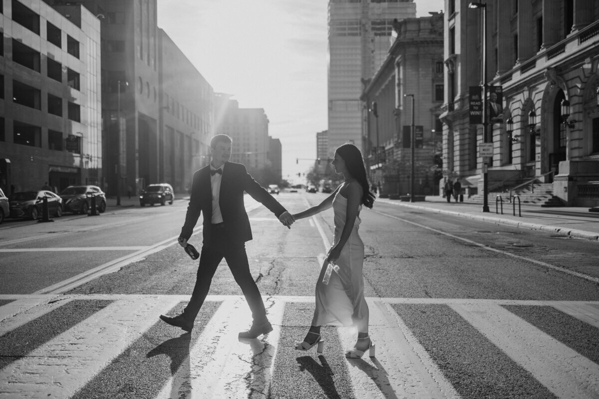 bride and groom under confetti