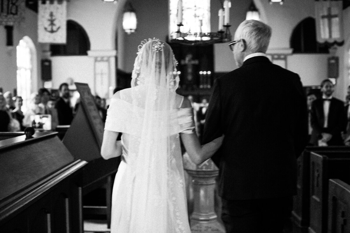 Bride and dad walking down the aisle