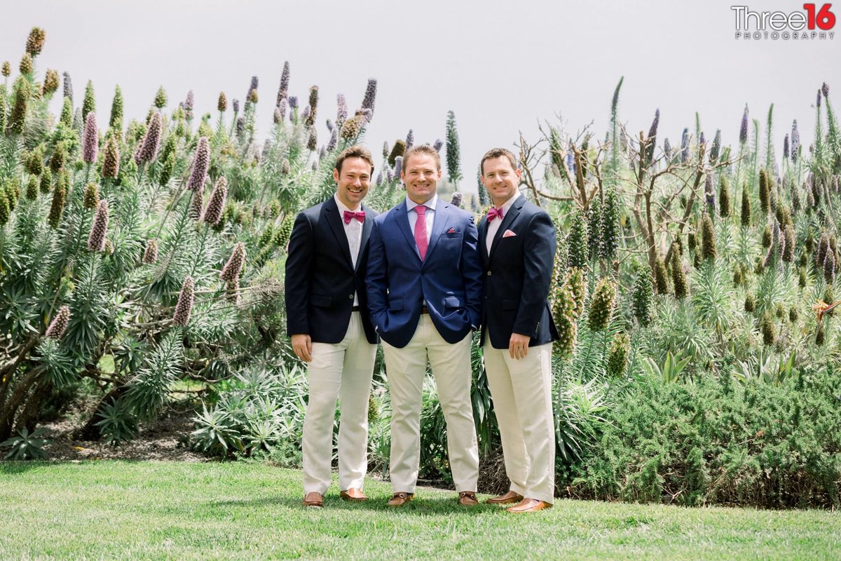 Groom poses with his Groomsmen