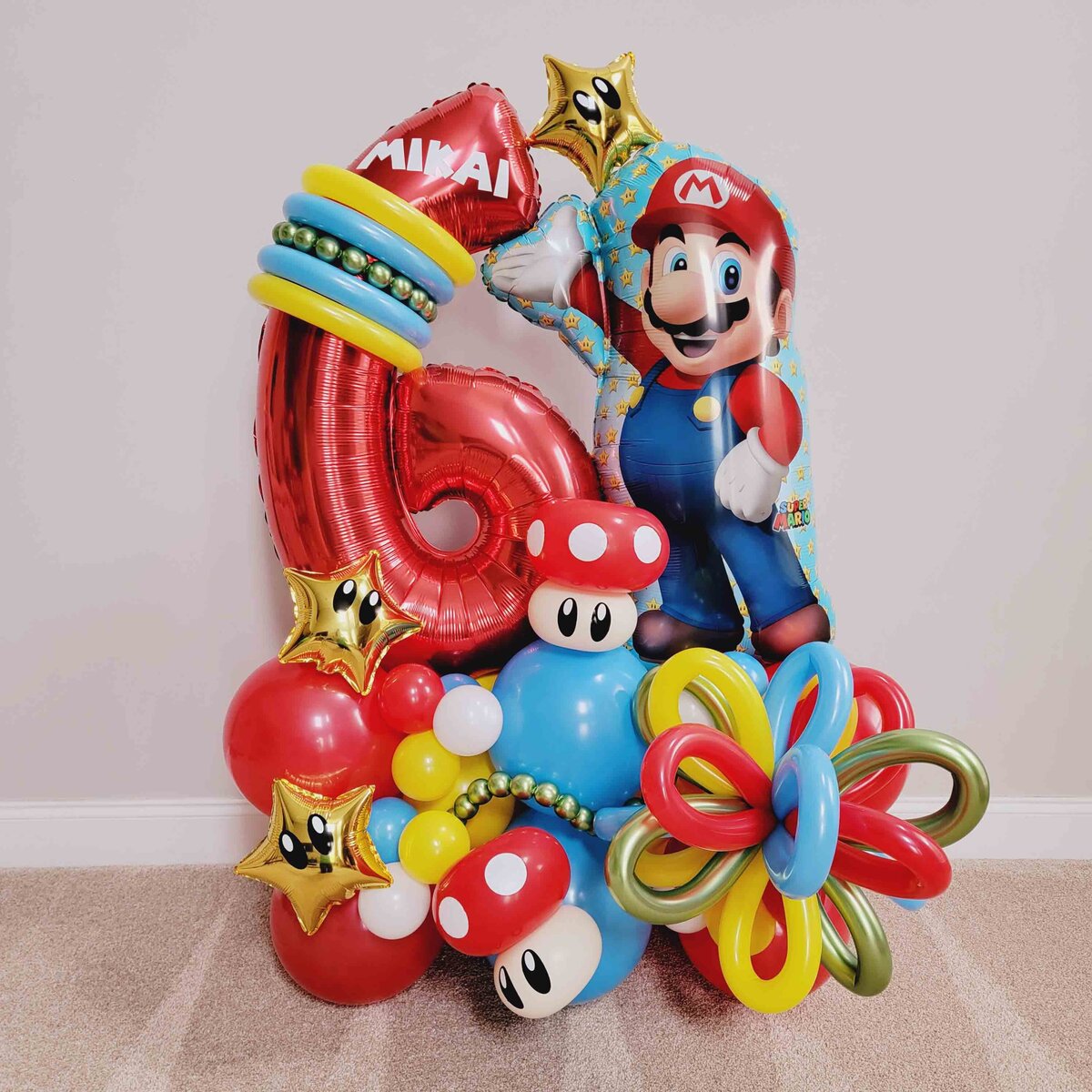 boy celebrations to the next level with Air with Flair Decor's Premium Balloon in a captivating Mario Bros theme.