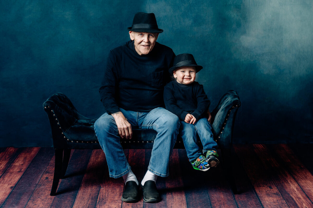 boy and Grandfather smile with hats in session with Prescott family photographer Melissa Byrne
