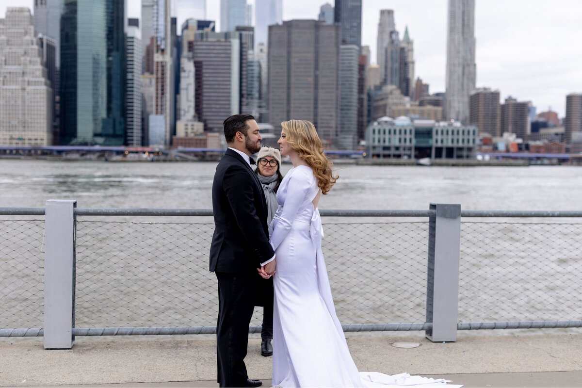 Saying I DO in front of the NYC skyline during an elopement.