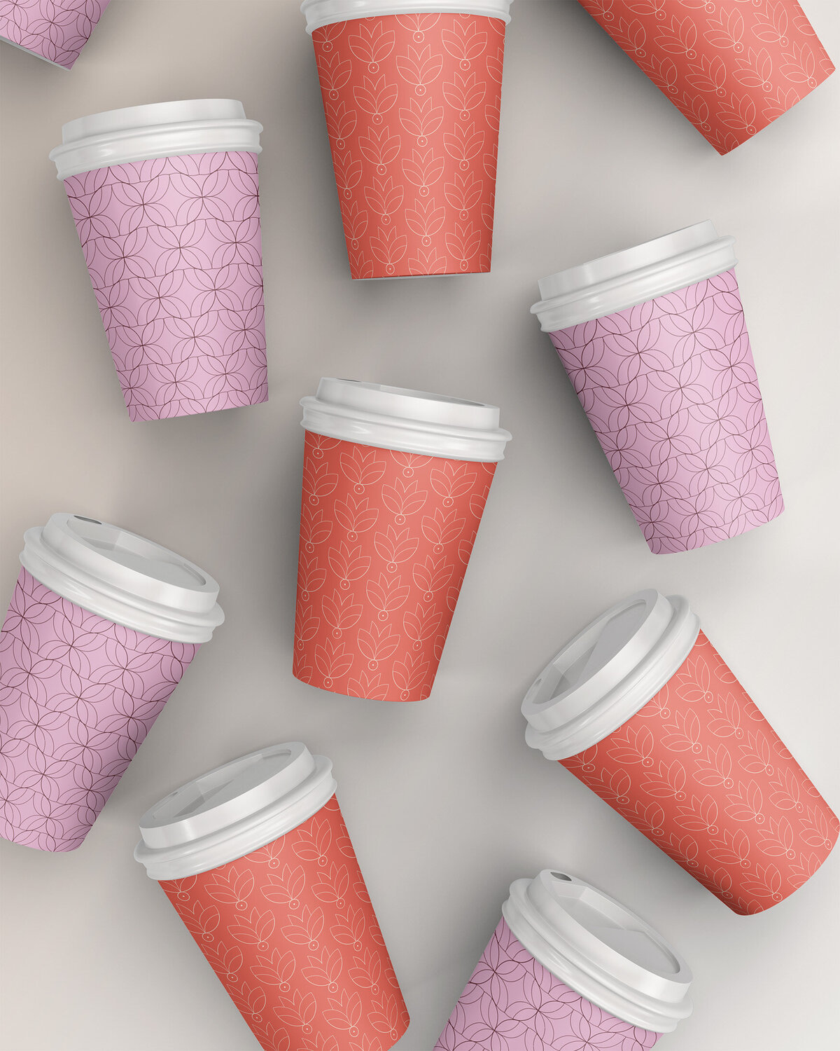 MEHR branded koffiebekers in roze en rood patroon