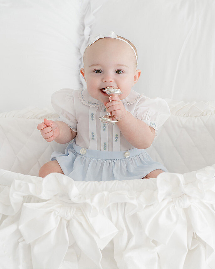 baby girl photographed in feltman brothers outfit in studio in st simons island