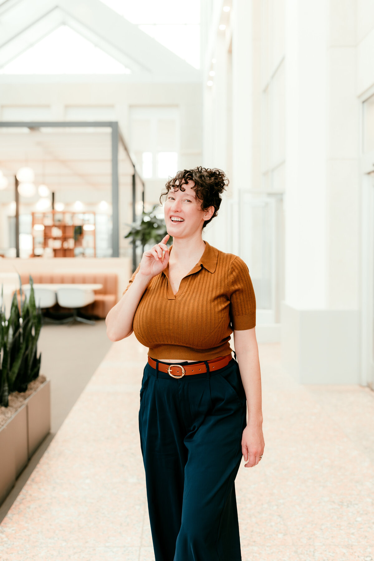 A creative entrepreneur showcasing their personality during a Minnesota branding photo session.