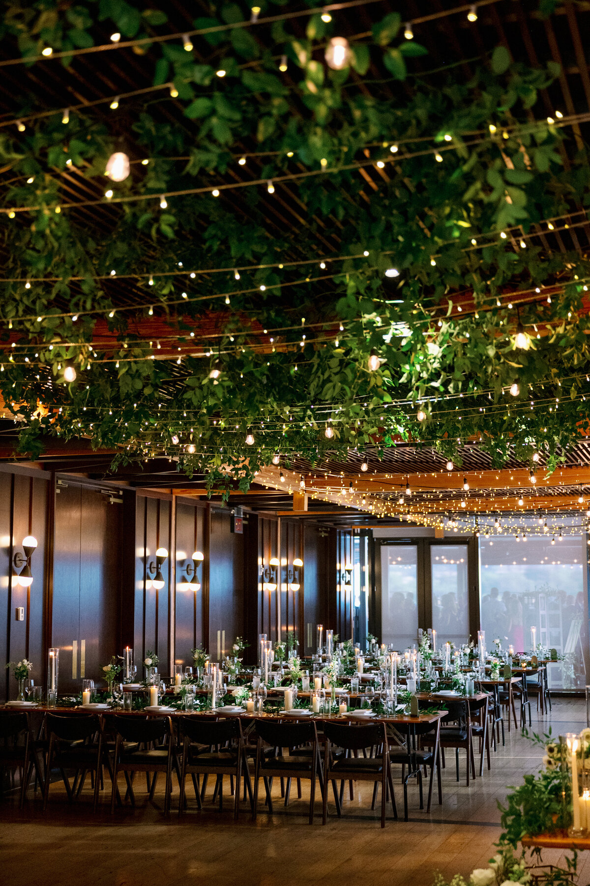 Garden inspired wedding flowers featuring smilax, panda anenomes and white garden roses. Modern and elegant floral design. Kim Pawley Helfgott is an Easton, MD floral designer.
