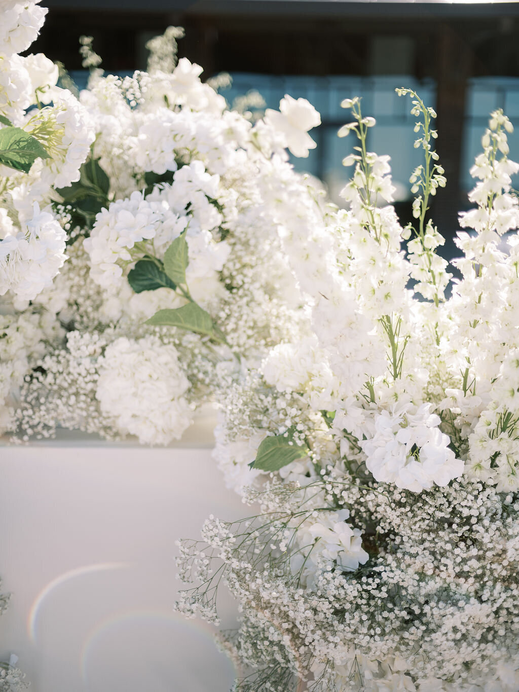 A close-up of delicate white blooms arranged beautifully for the ceremony.