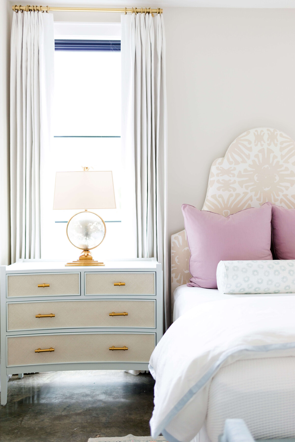 oyster creek studios building belt new build white bed and white and tan bedside table in bedroom