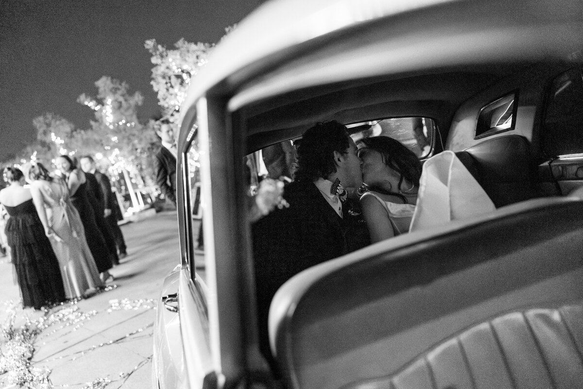A photo of the bride and groom during the reception  at their Astorian wedding in Houston.