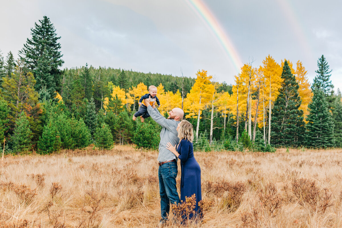 family with rainbow during family photos