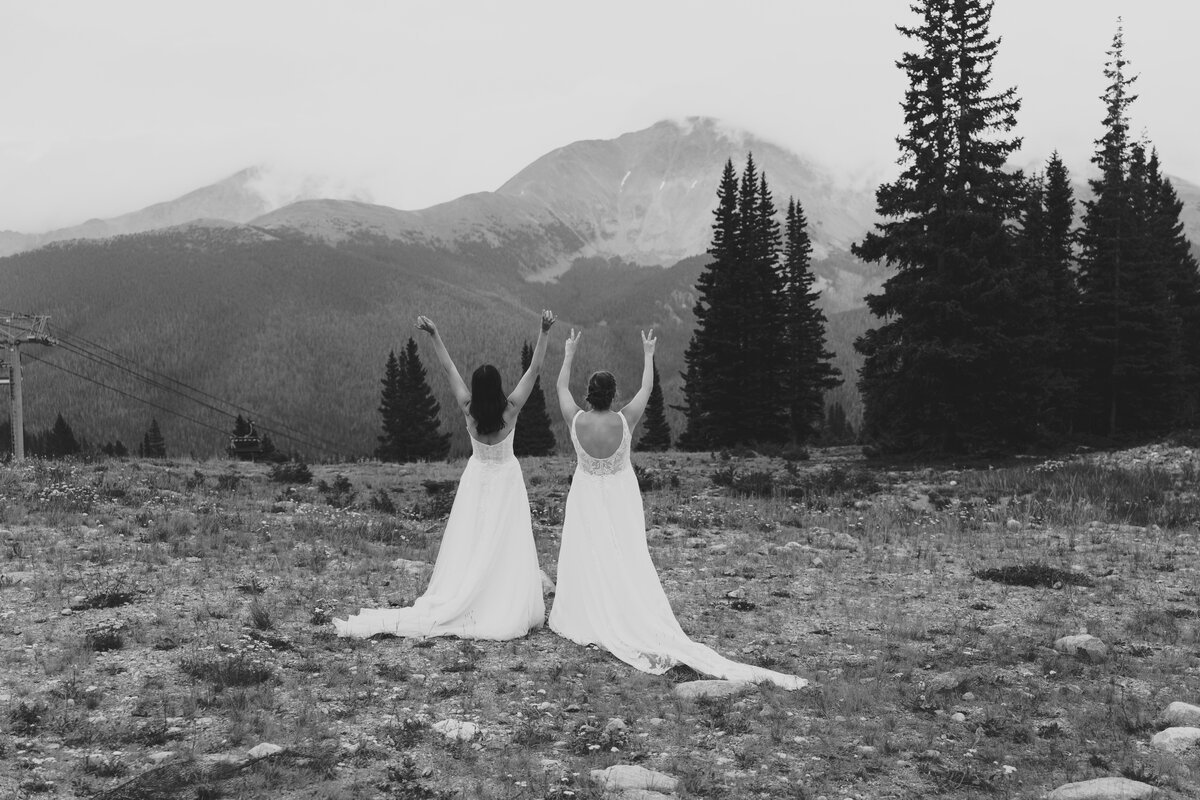 Two brides celebrating wedding in mountains winter park colorado