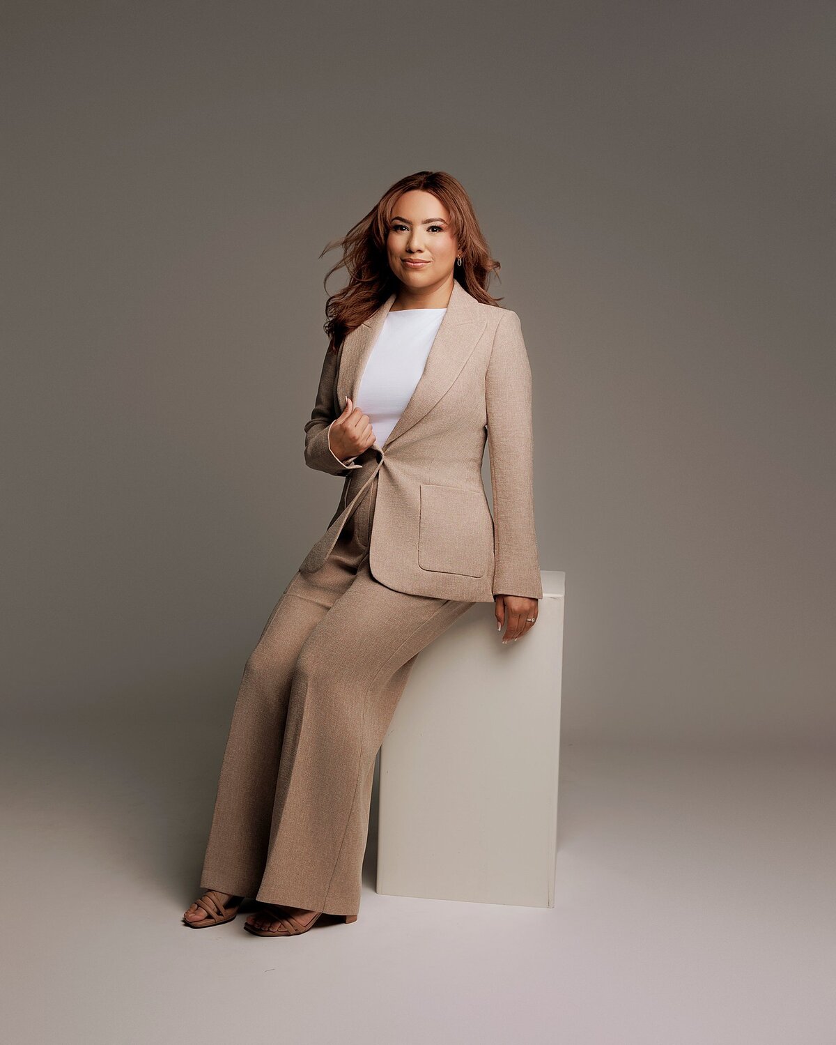 Personal branding image of confident woman, taken at upscale headshot studio in Pflugerville