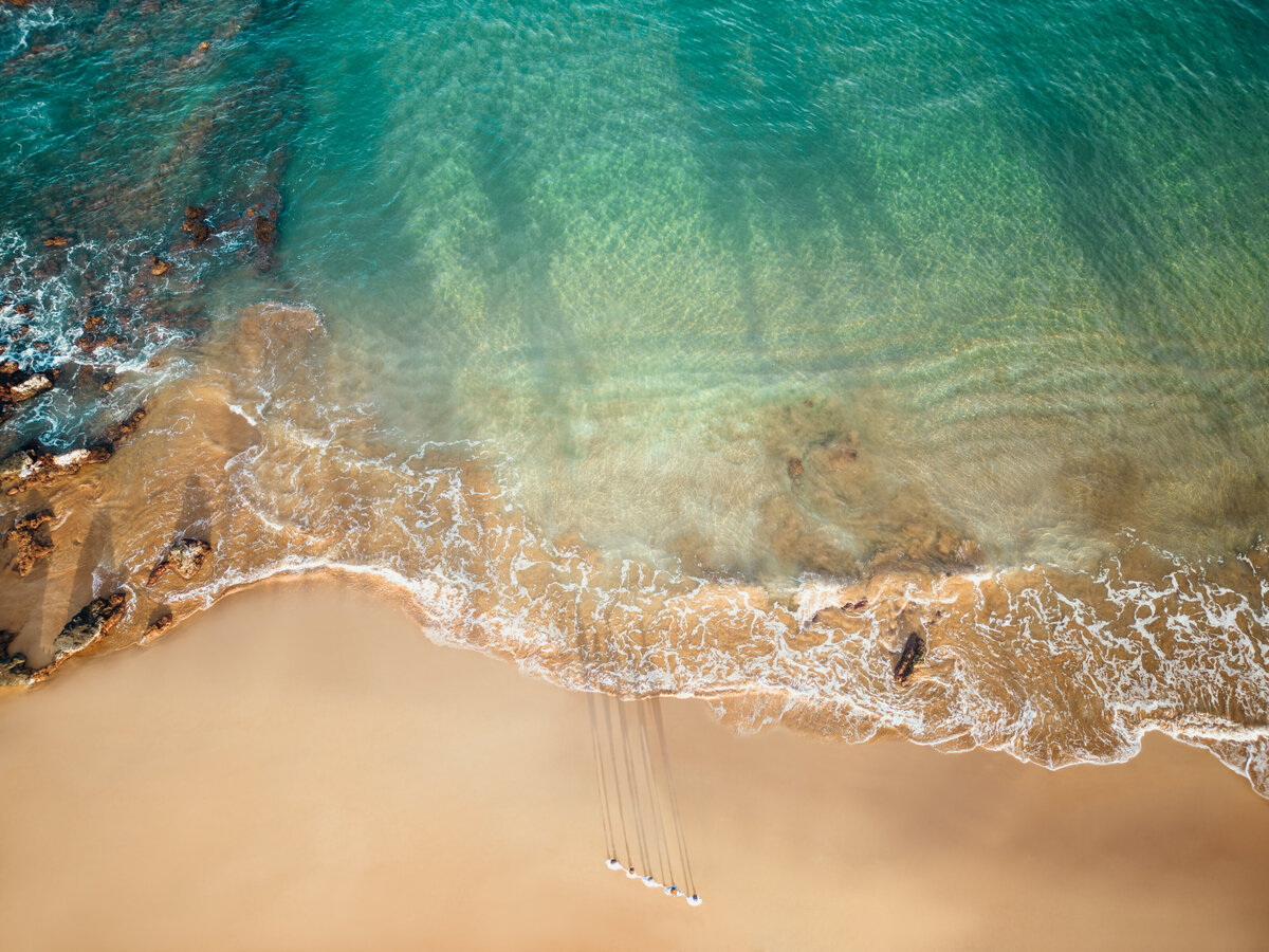 Maui Family Photographers capture drone photos of ocean during beach family photos