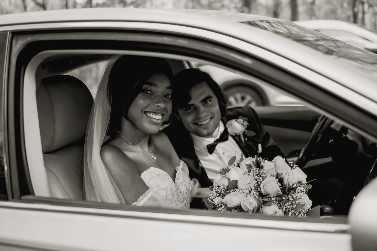 bride and groom ready to drive away