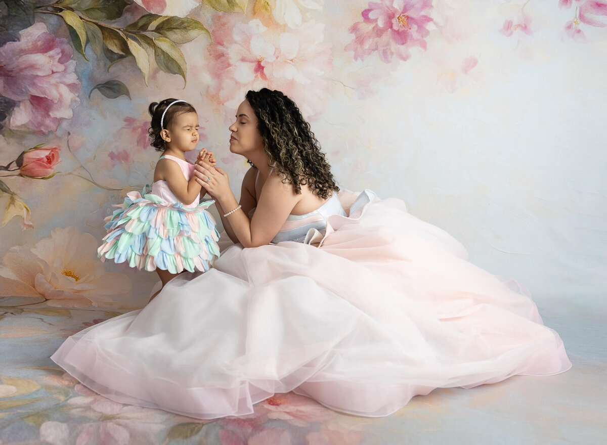 mother and daughter praying together during fine art portrait session in la vernia texas