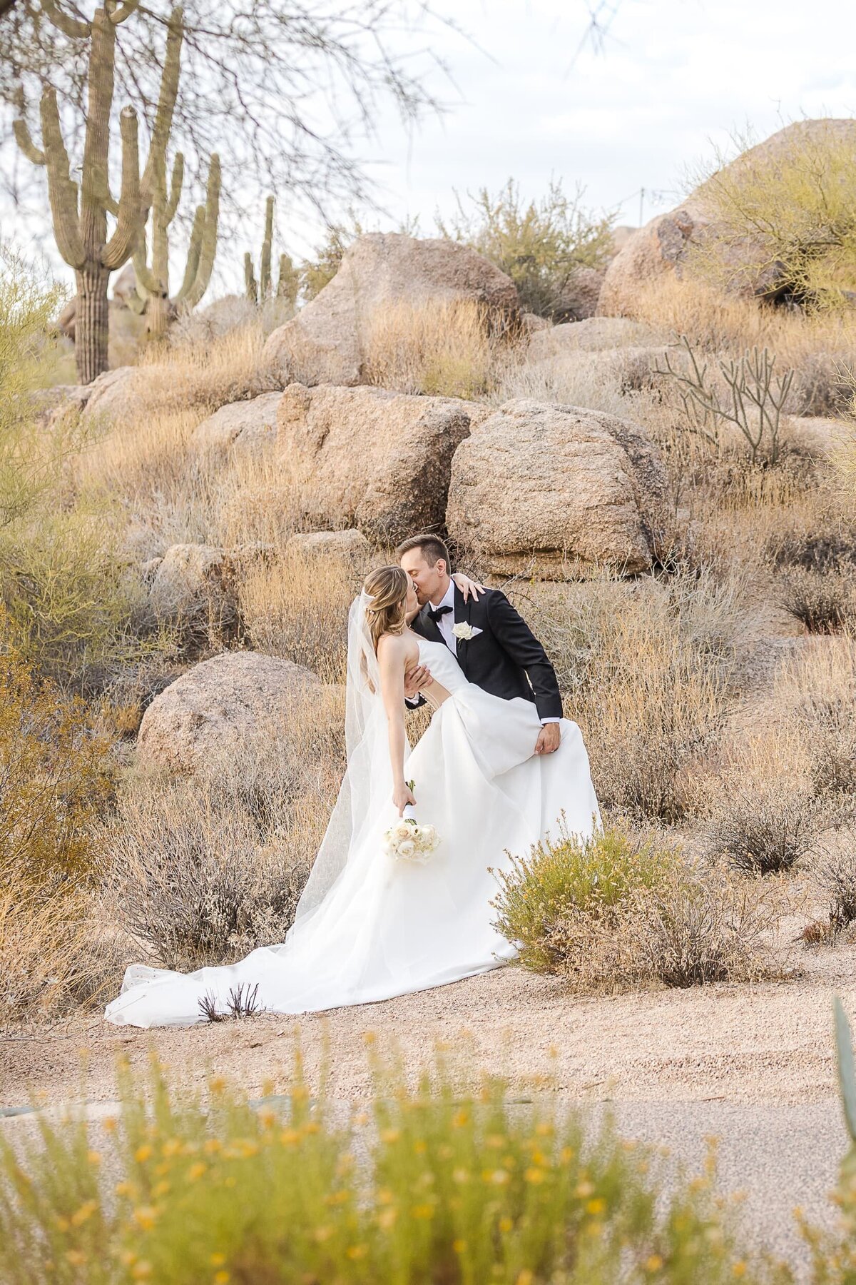 Phoenix-Wedding-Photographer-and-Videographer-Troon-North-Scottsdale-couple-dipping-WedWed-1454