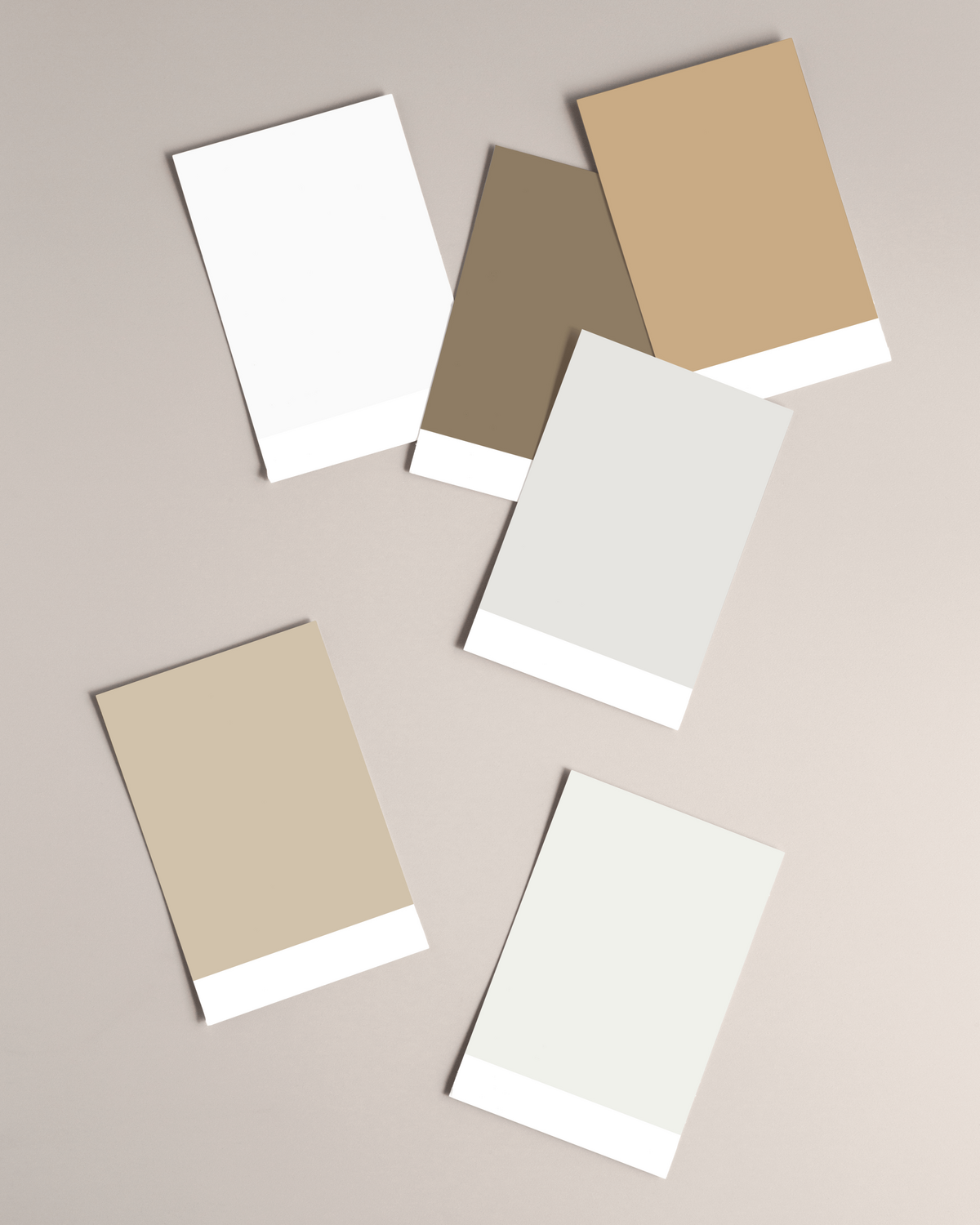 refined elegant stationery designs featuring neutral color tones and organic-inspired patterns