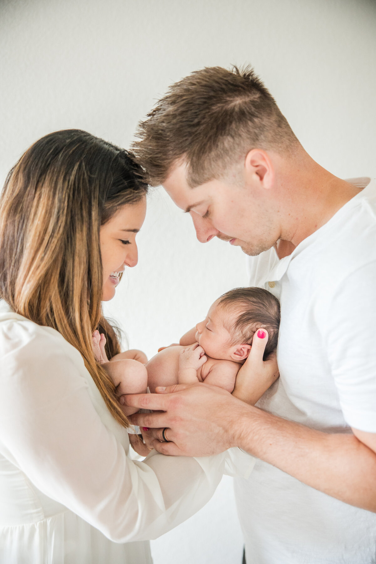 mom with baby in white dress