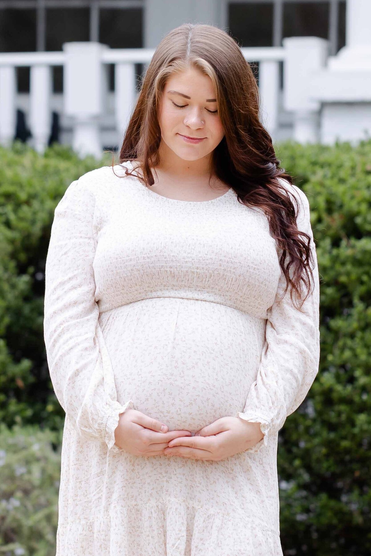 first time mom in a white maternity dress in Columbia SC