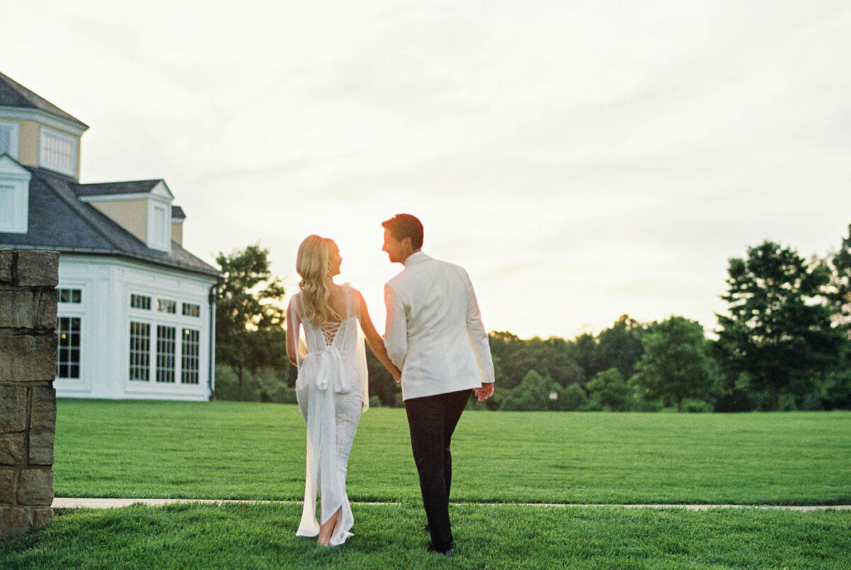 couple walking at sunset