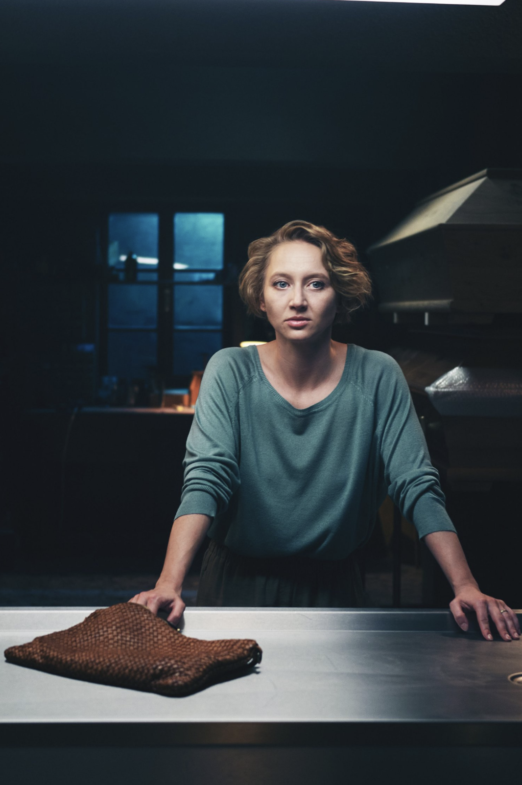 Characters arranged with symmetry and depth in a still from a drama.