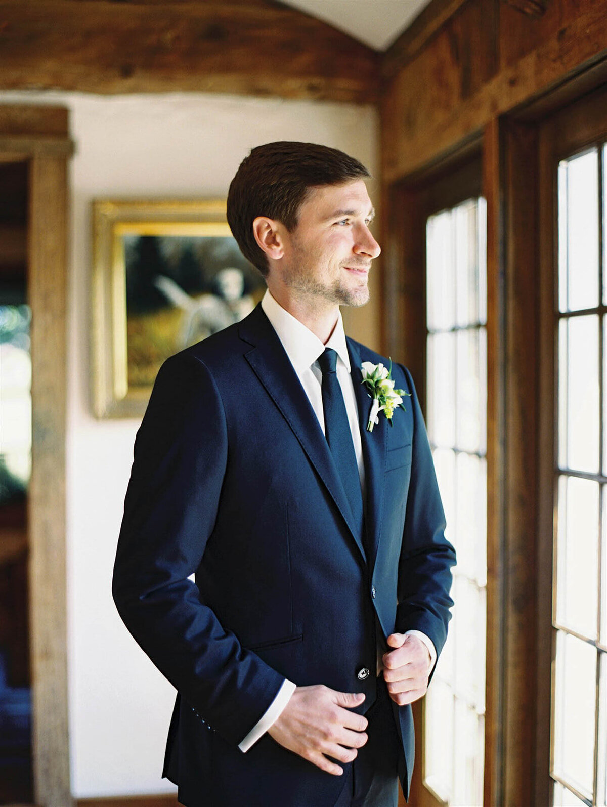 Groom looking out the window
