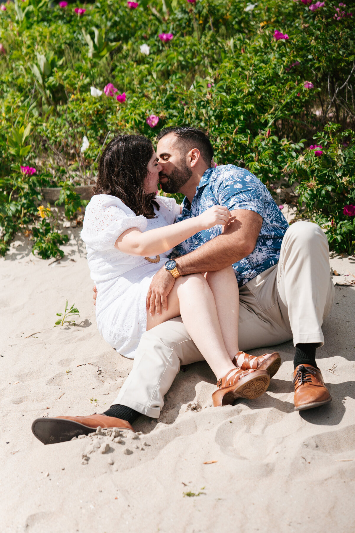 Natural light engagement portrait at Lynch Park’s rose garden in Beverly, Massachusetts