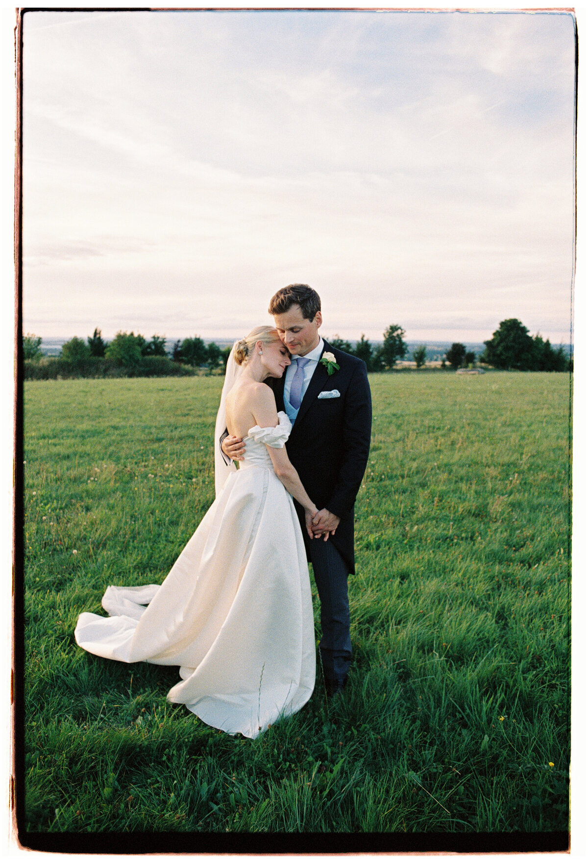 Bride and groom portraits during their Wiltshire film wedding, captured by Kate Winters Photography.