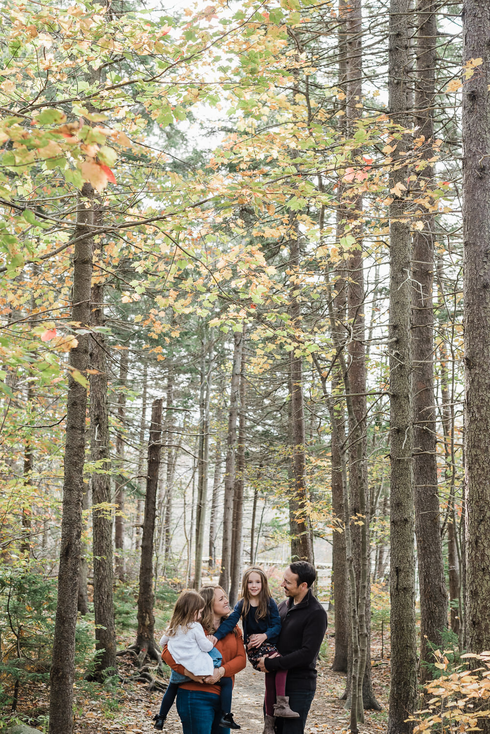 Family portrait photography session in the forest.