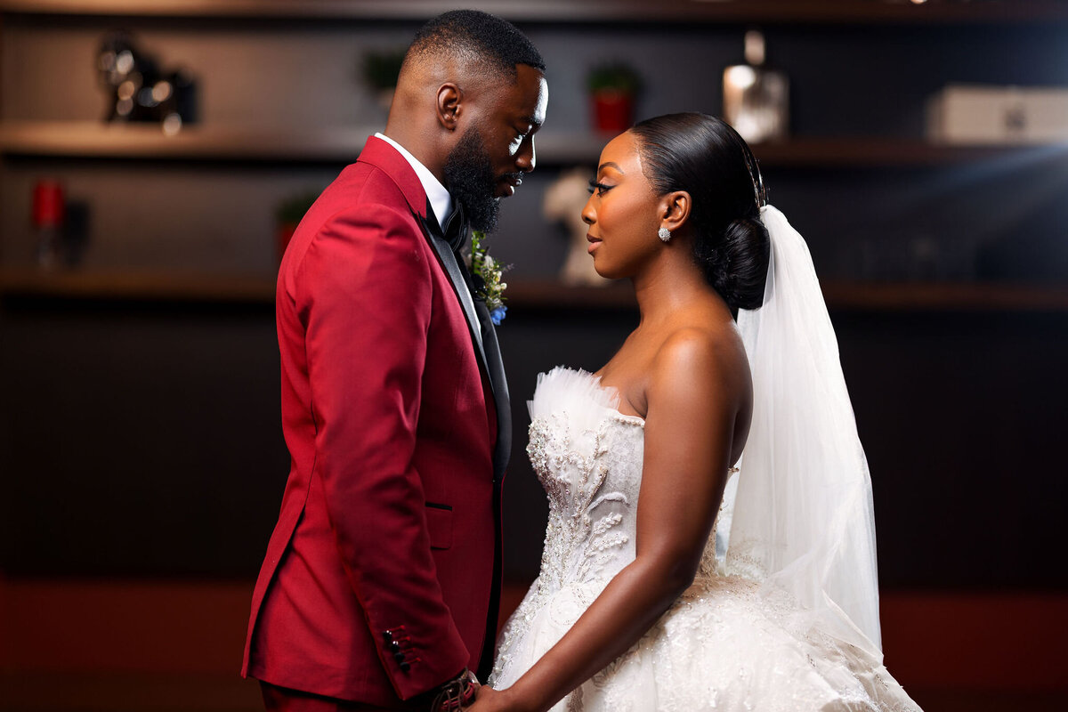 Tomi and Tolu Oruka Events Ziggy on the Lens photographer Wedding event planners Toronto planner African Nigerian Eyitayo Dada Dara Ayoola ottawa convention and event centre pocket flowers Navy blue groom suit ball gown black bride classy  68