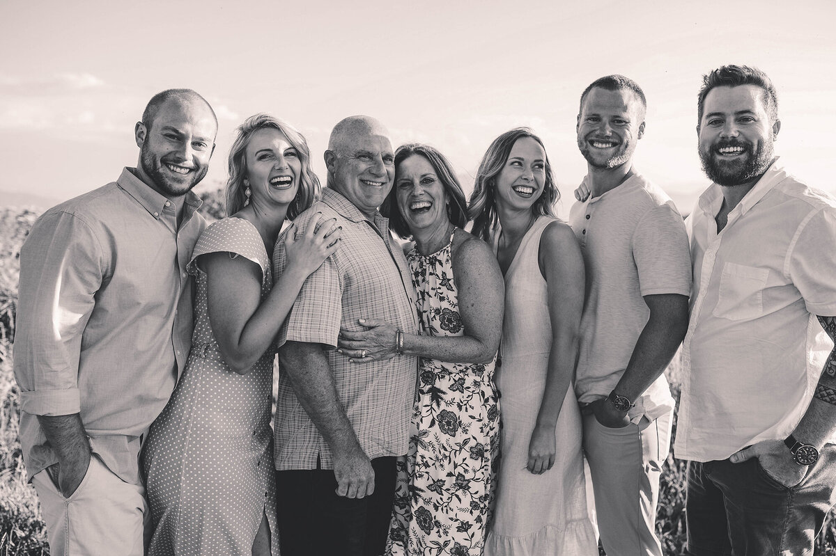 Extended Family laughs together during Family Photos in Asheville, NC.