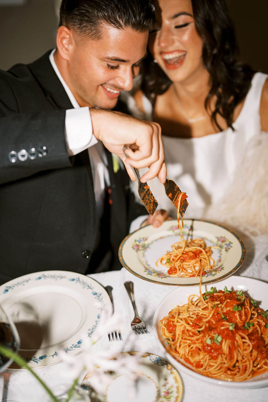 Couple eating Italian for their wedding dinner in New Jersey