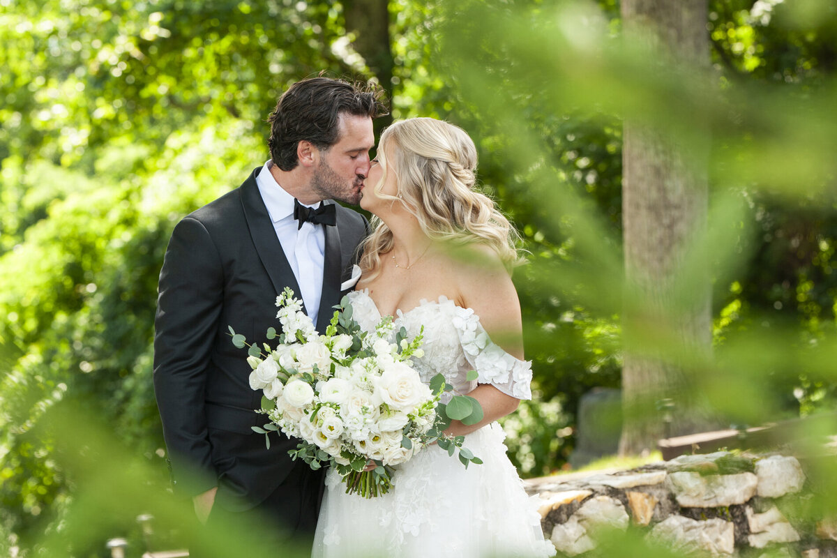 Couple kissing at wedding