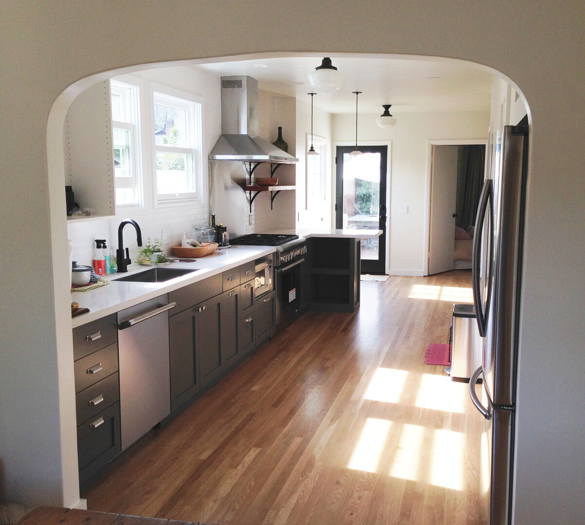 Newly renovated kitchen with light streaming in the windows