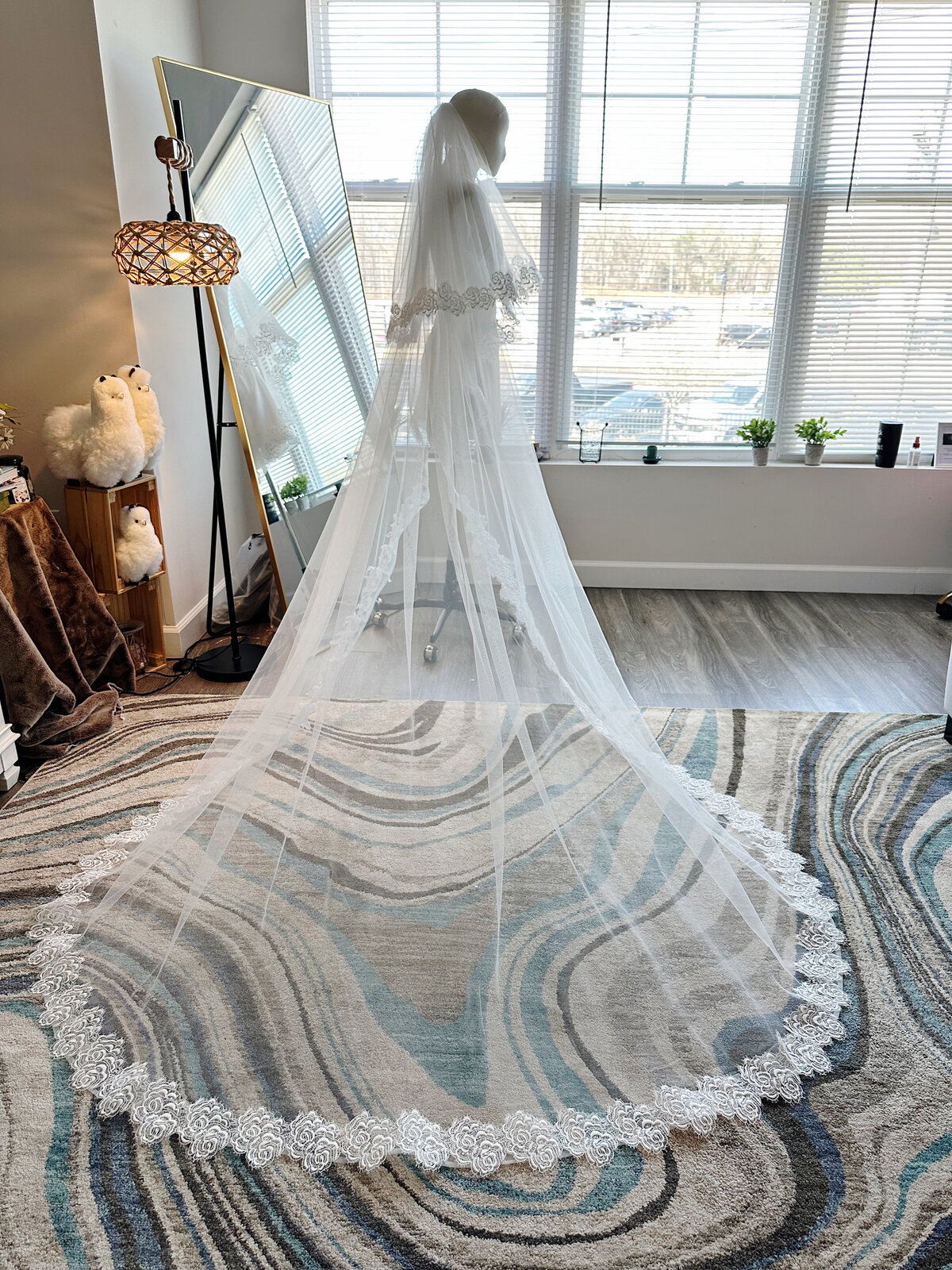 Soft blusher veil with floral lace embroidery and dreamy texture
