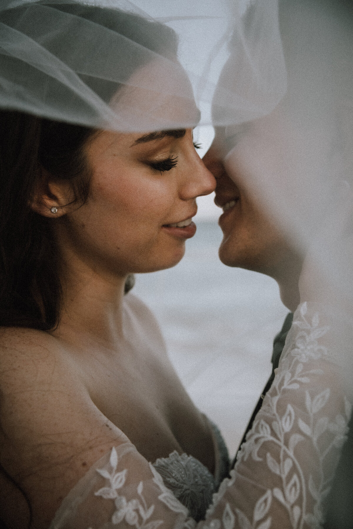 Going for a  kiss on the beaches of Tulum. Photo by: Tulum Wedding Photos