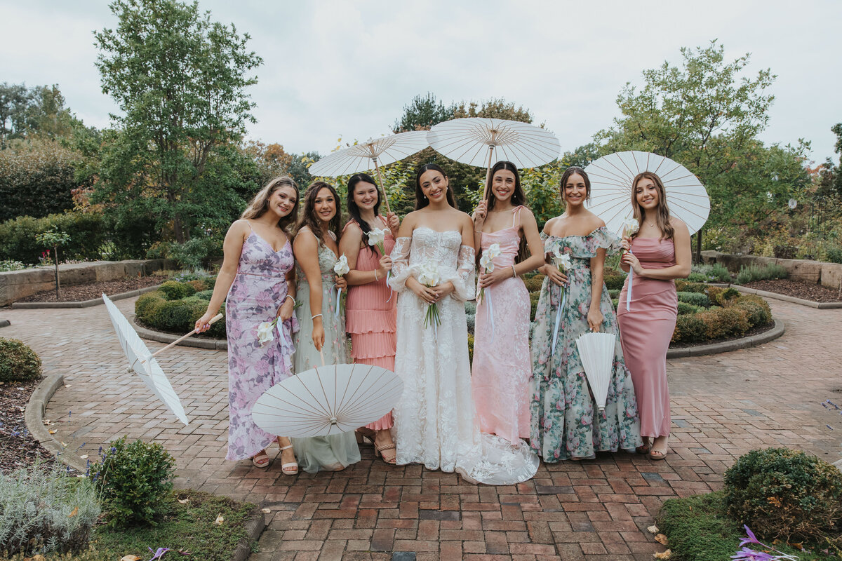 bride and bridesmaids in a garden